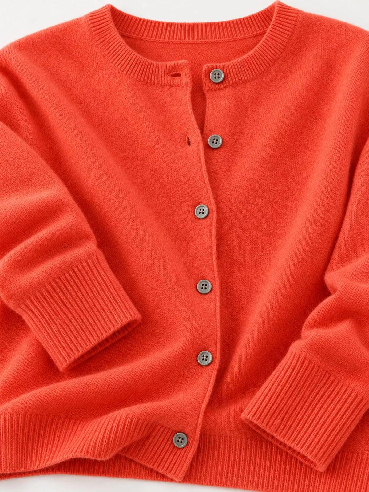 Button-down cardigan, orange button cuff detail