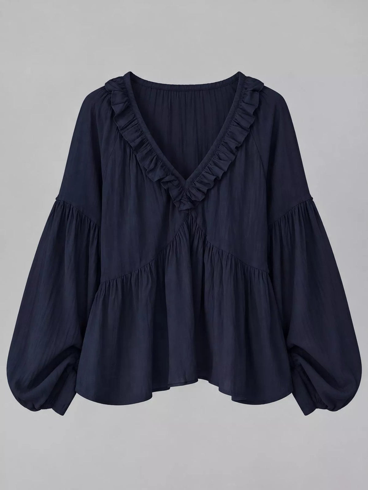 Navy blue ruffled v neck blouse, front view