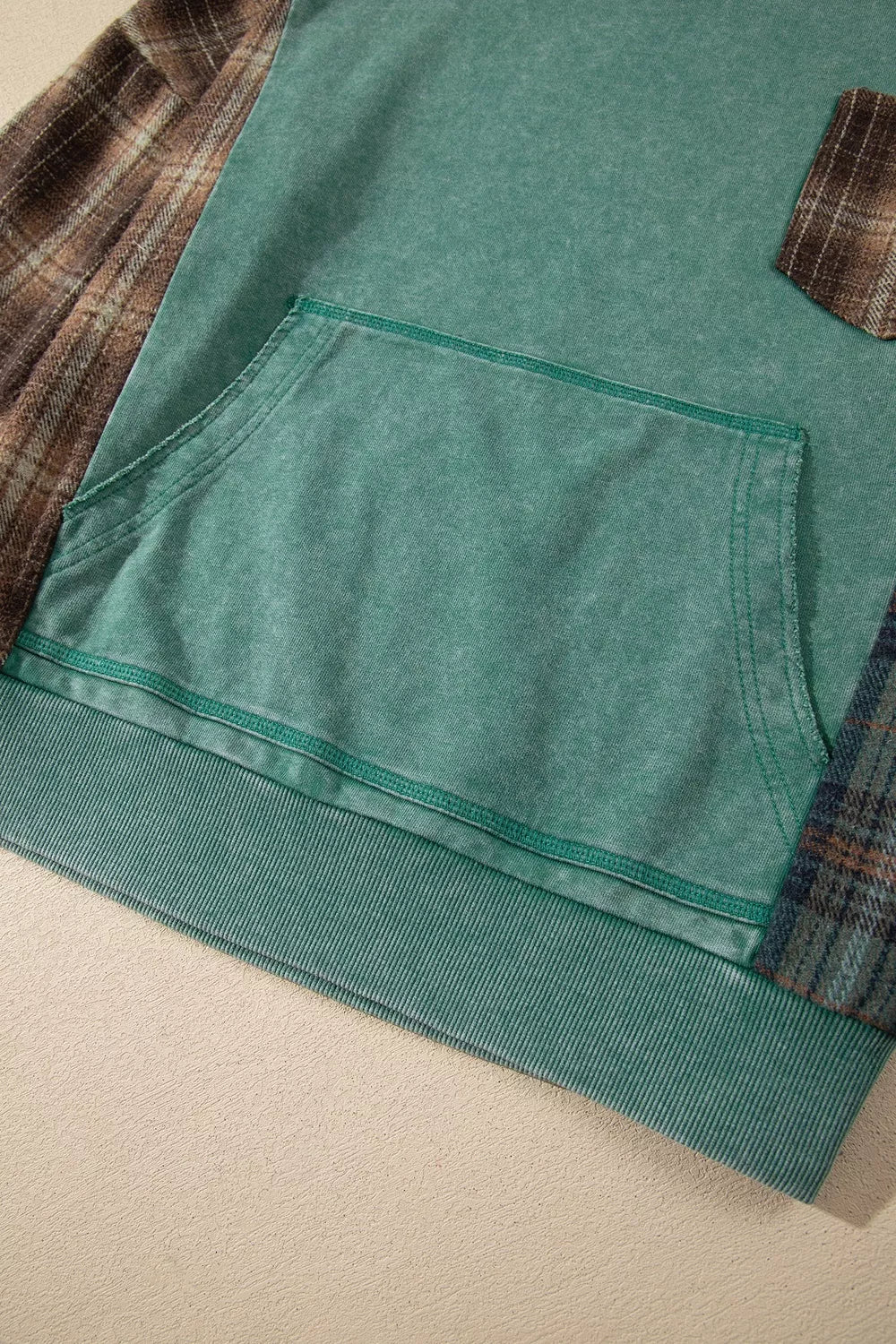 Plaid Kangaroo Pocket Hoodie in green, pocket detail