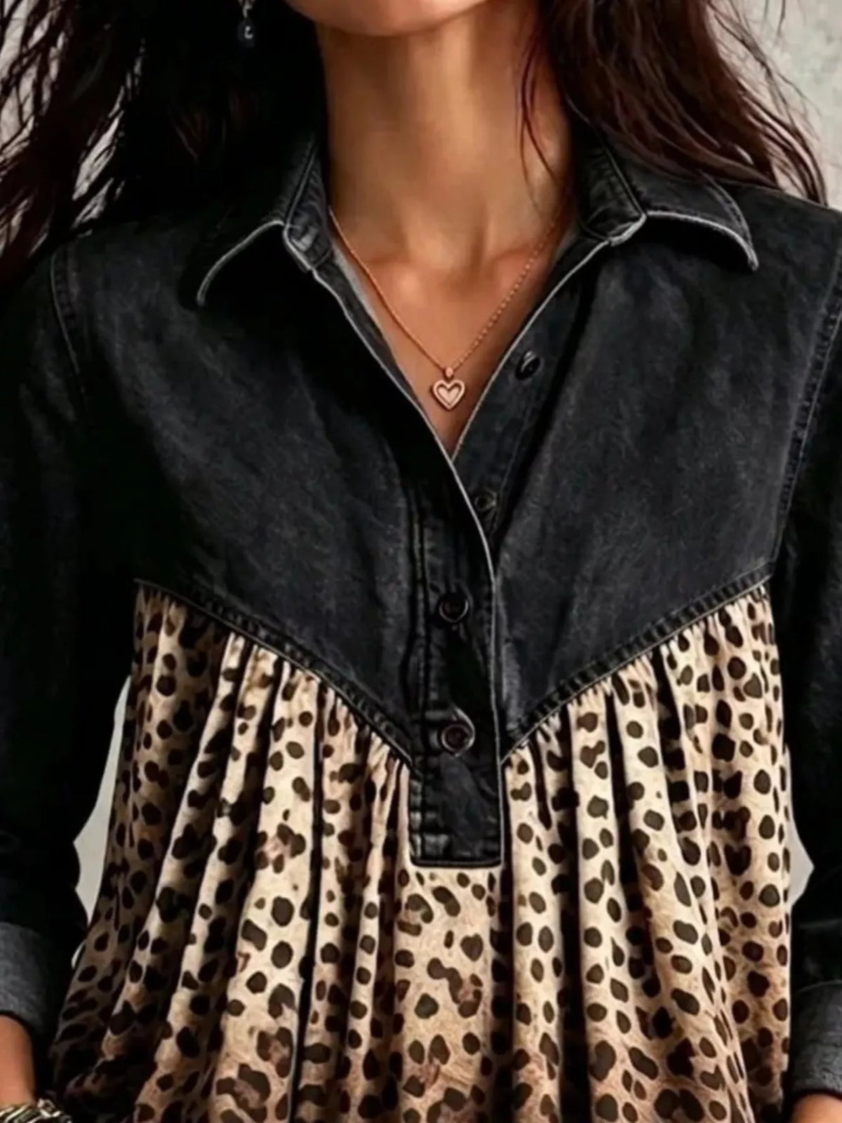 Black leopard-panel button-front blouse, neckline close-up