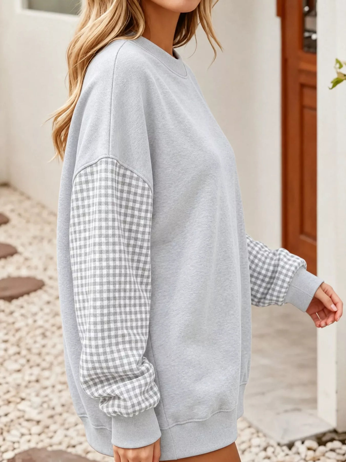 Gray and white gingham sleeve dropped shoulder sweatshirt, side view