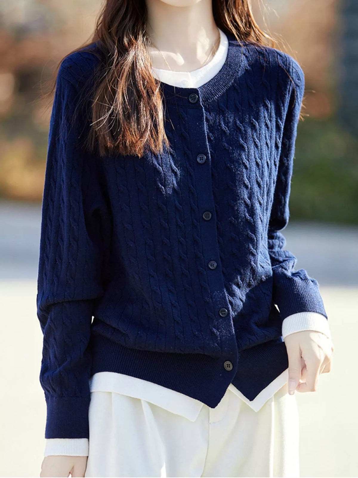 Navy cable-knit button-down cardigan