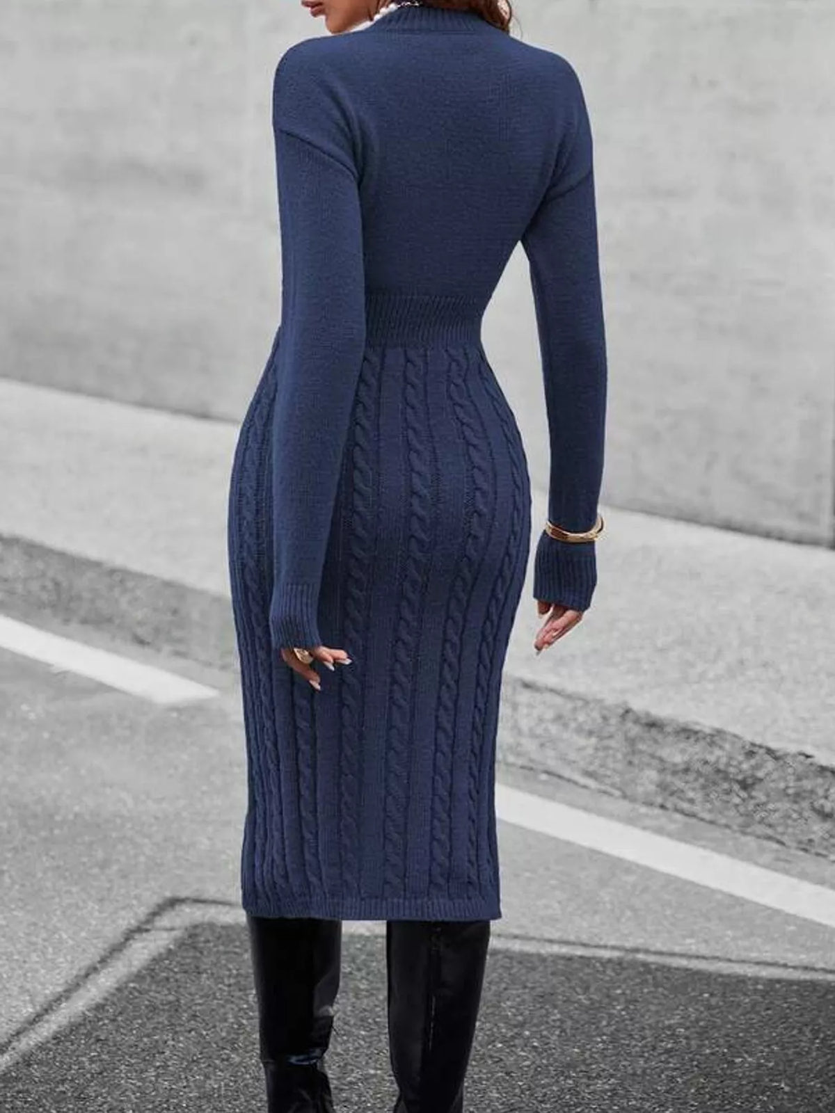Women's Mock Neck Cable Knit Sweater Dress with Front Slit in navy — back view