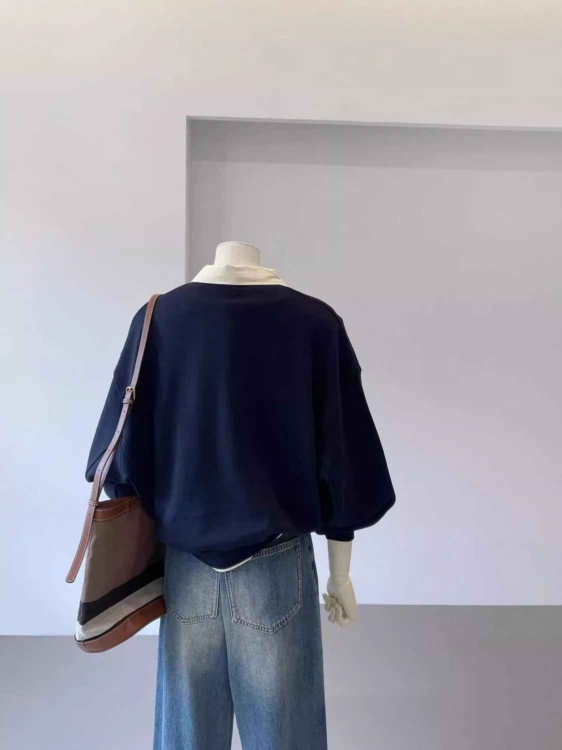 Navy polo-collar layered-look sweatshirt, back view