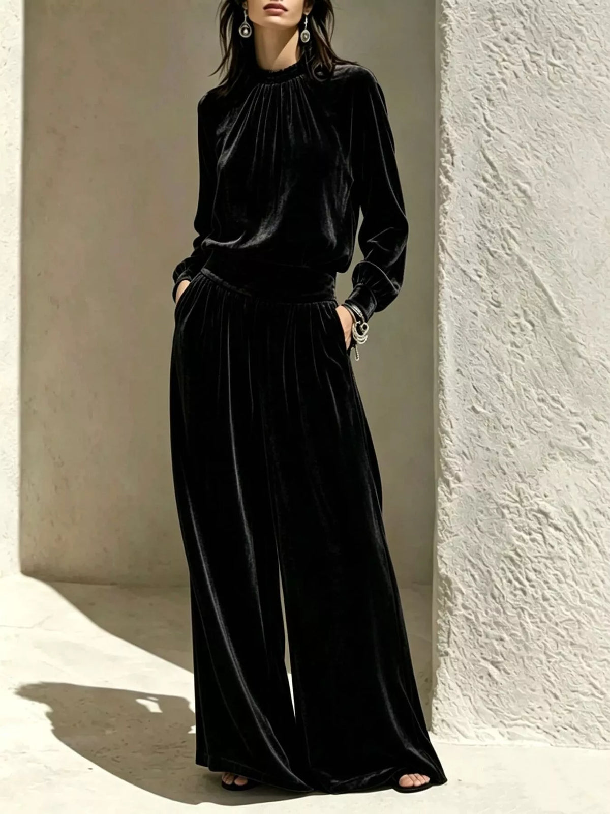 Black velvet mock-neck top and pants set, full front view