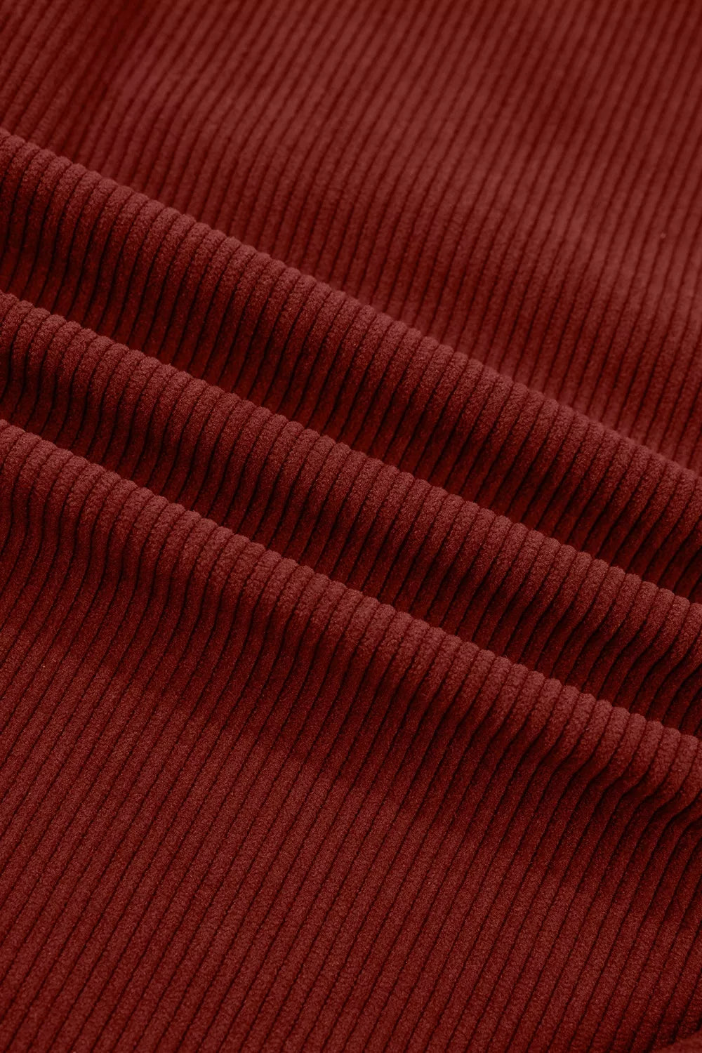 Rust corduroy button-down shirt, corduroy texture close-up