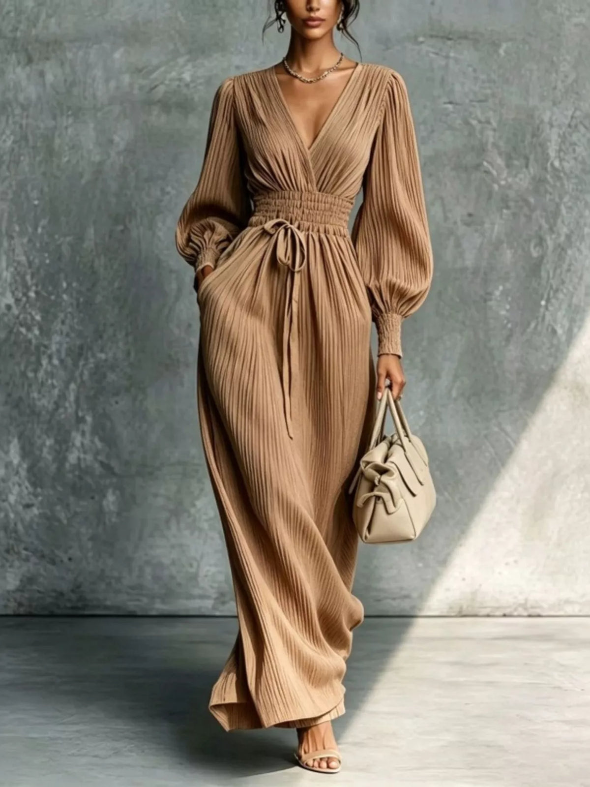 Camel pleated v-neck tie-waist maxi dress, full front view.