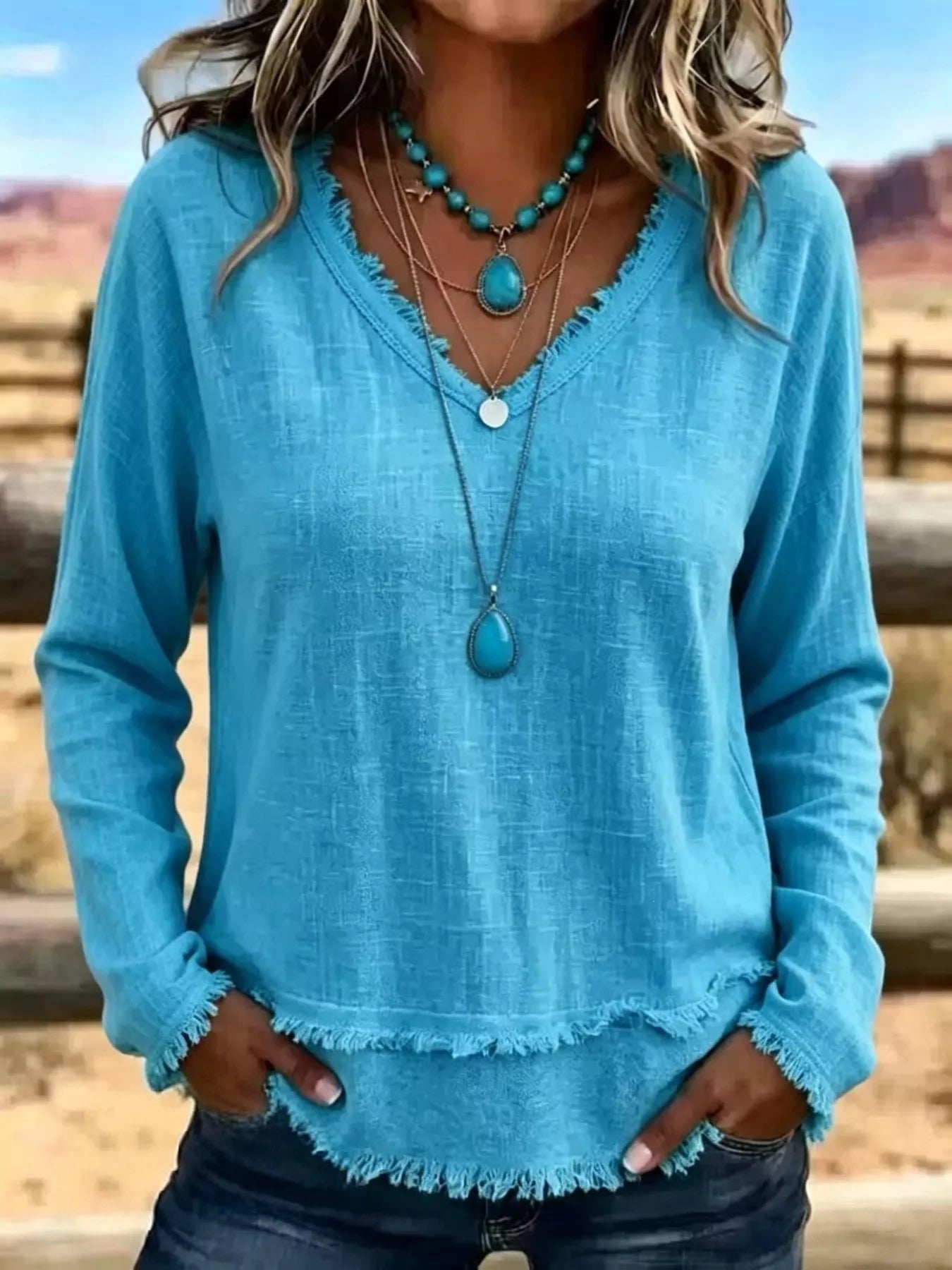 Trendsi V-Neck Long Sleeve Blouse with Frayed Hem Detail -