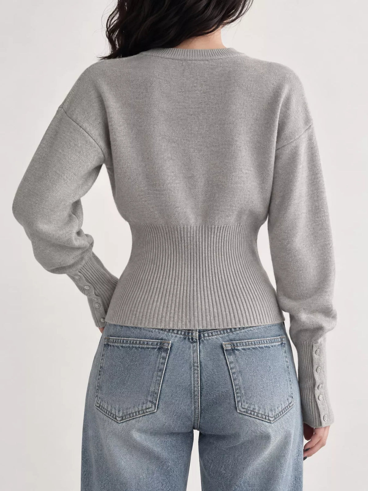 Gray button up ribbed waist cardigan, back view