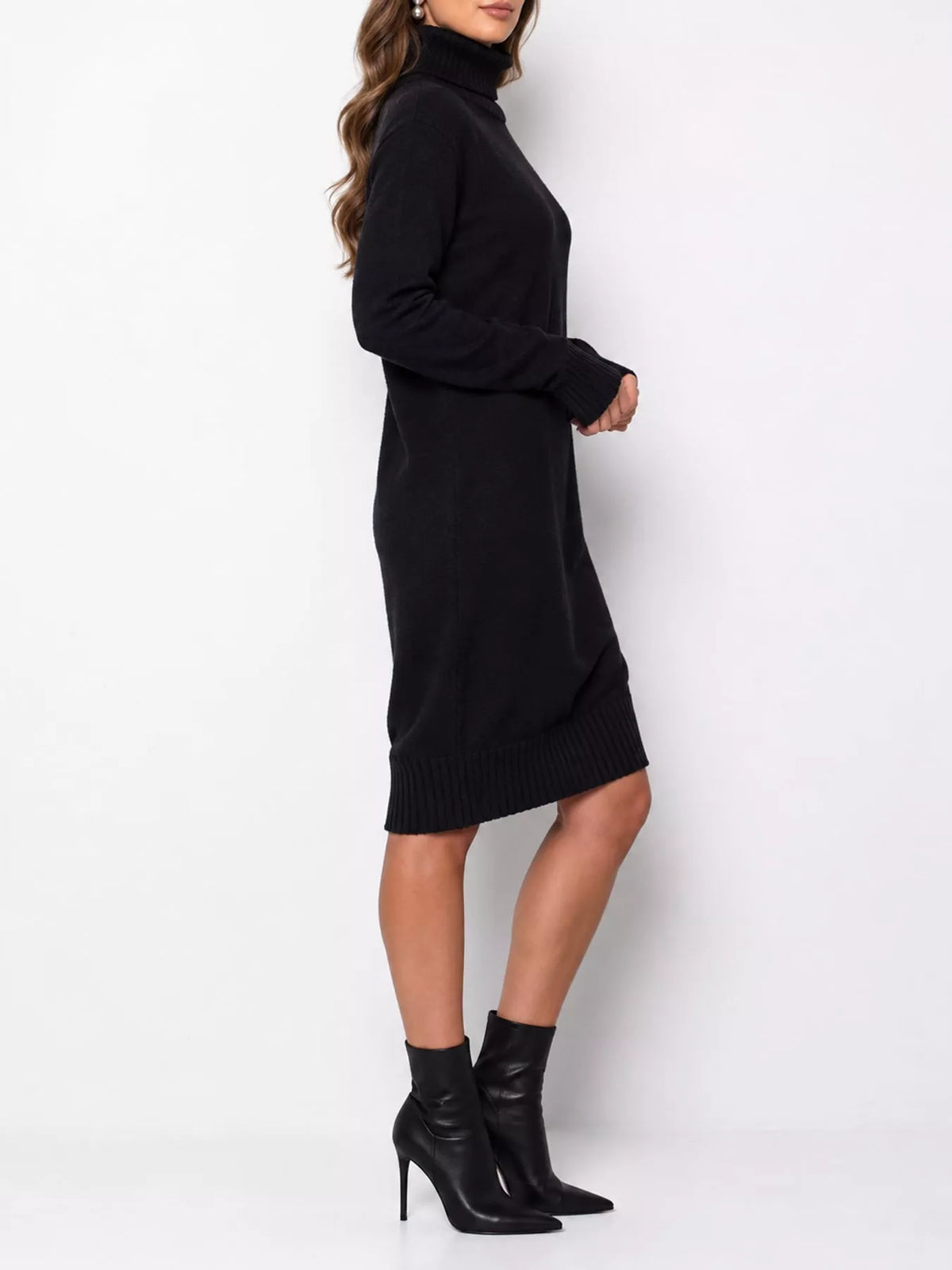 Black turtleneck sweater dress, side view