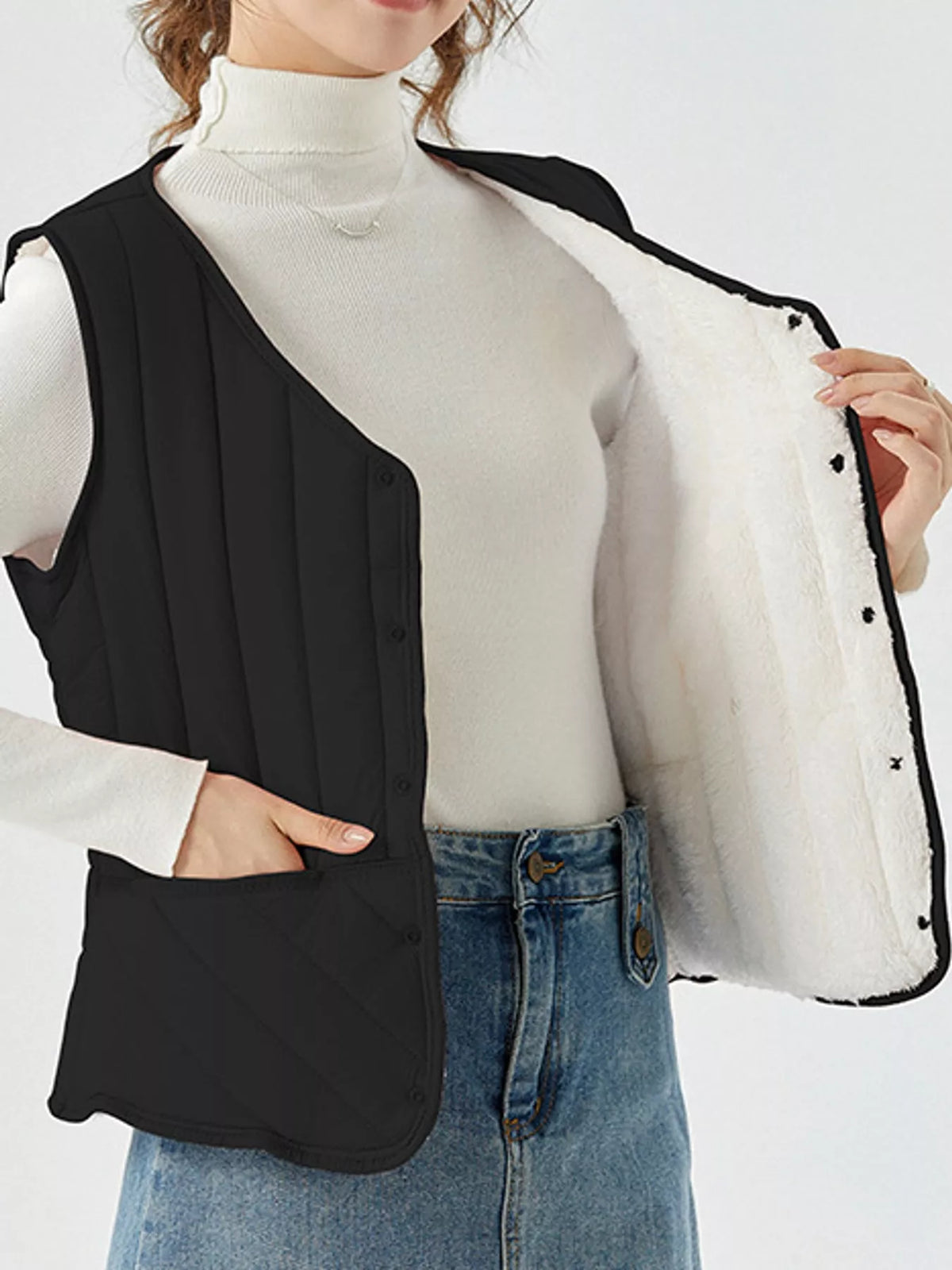 Quilted Button Up Vest in black, front view