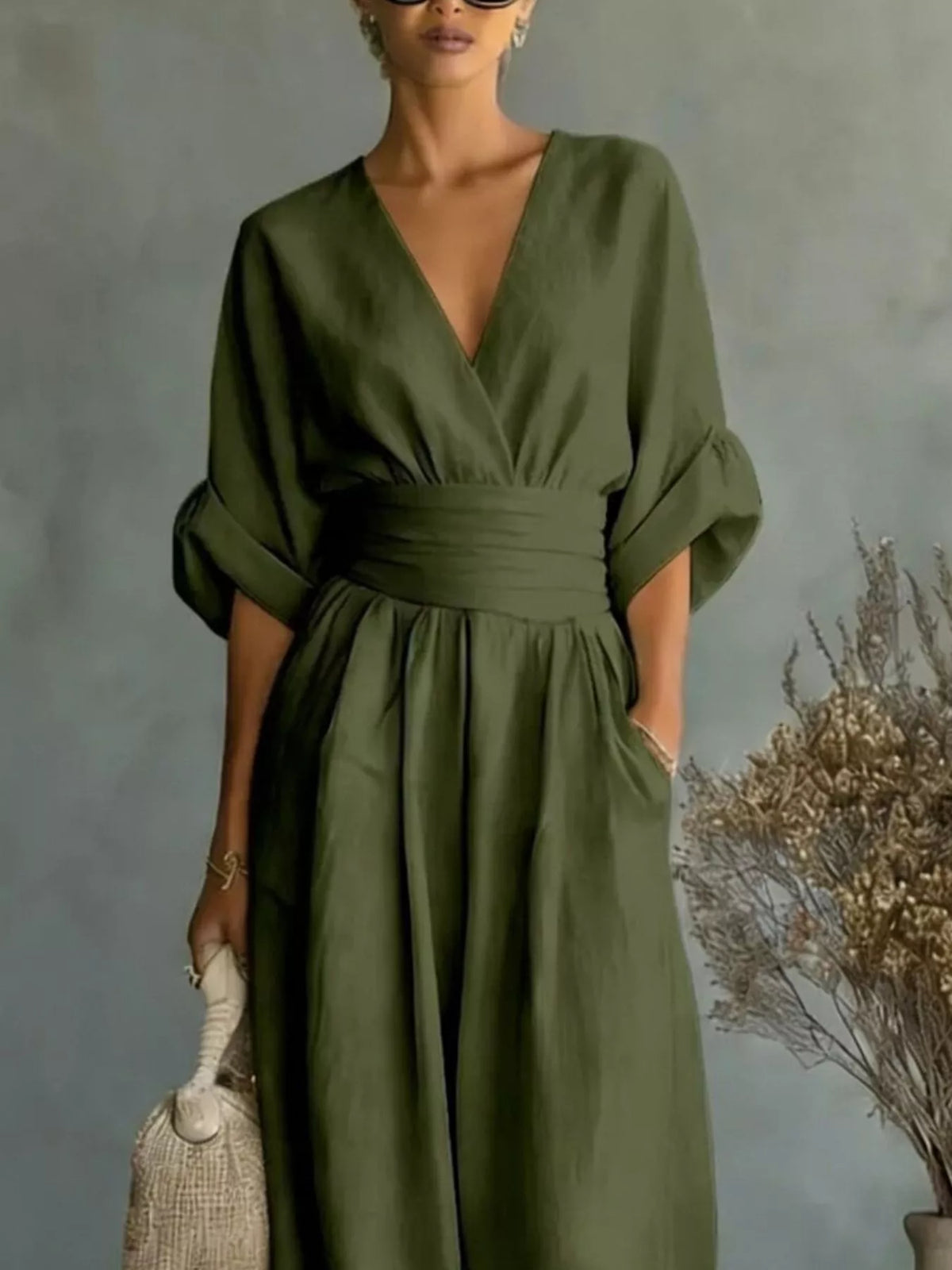 Olive green V-neck wide-leg jumpsuit, bodice detail