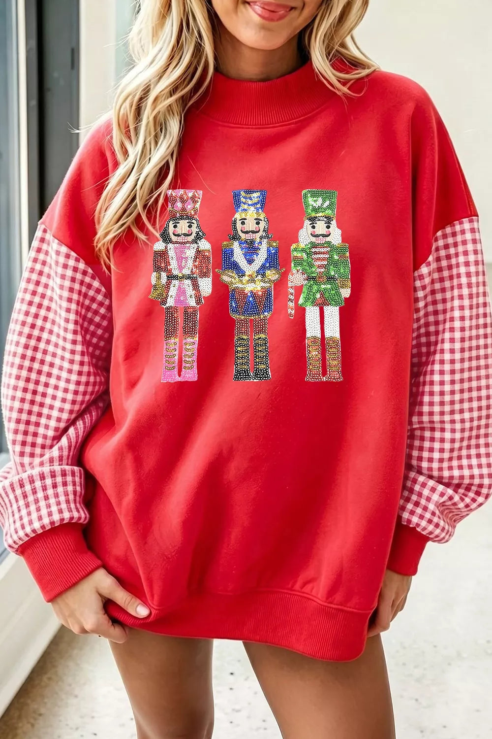 Sequin Nutcracker Plaid Sleeve Pullover Sweatshirt in deep red, front view