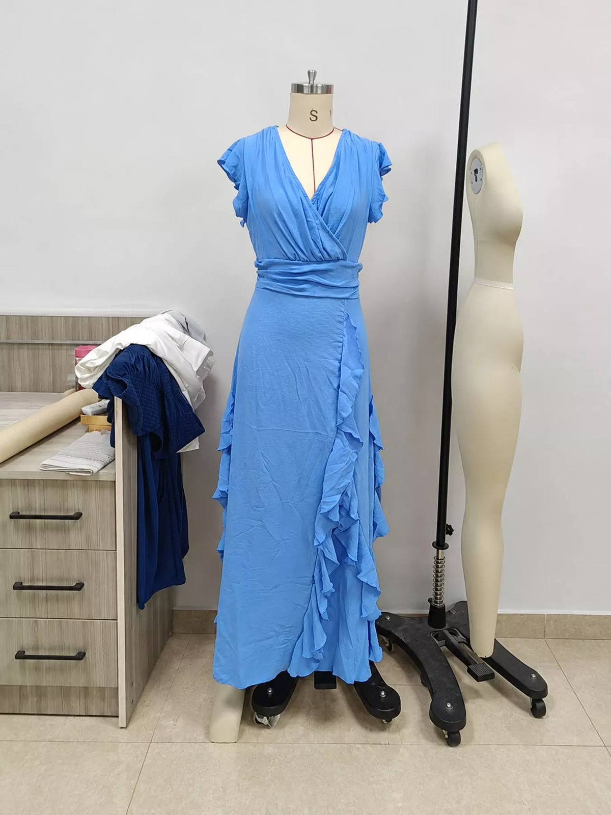 Blue ruffled surplice maxi dress, front on mannequin