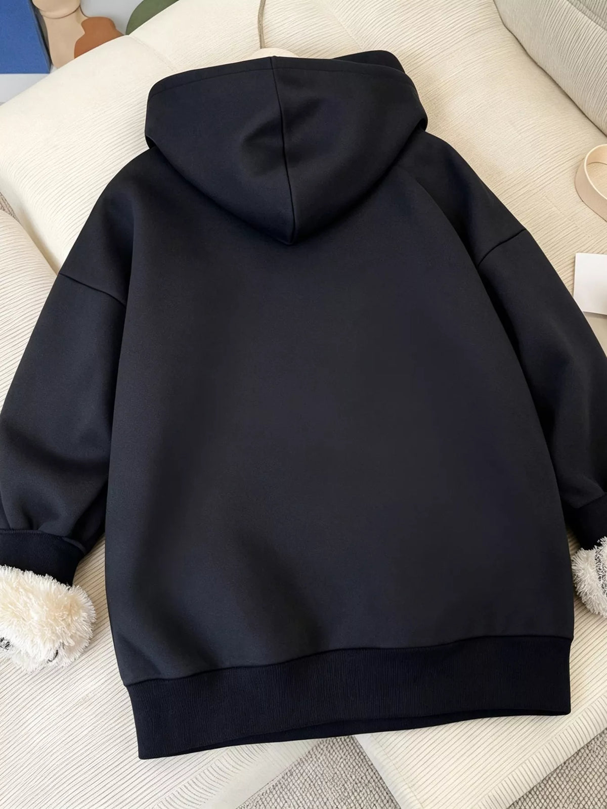 Black Fleece-Lined Zip-Up Hoodie folded hoodie view