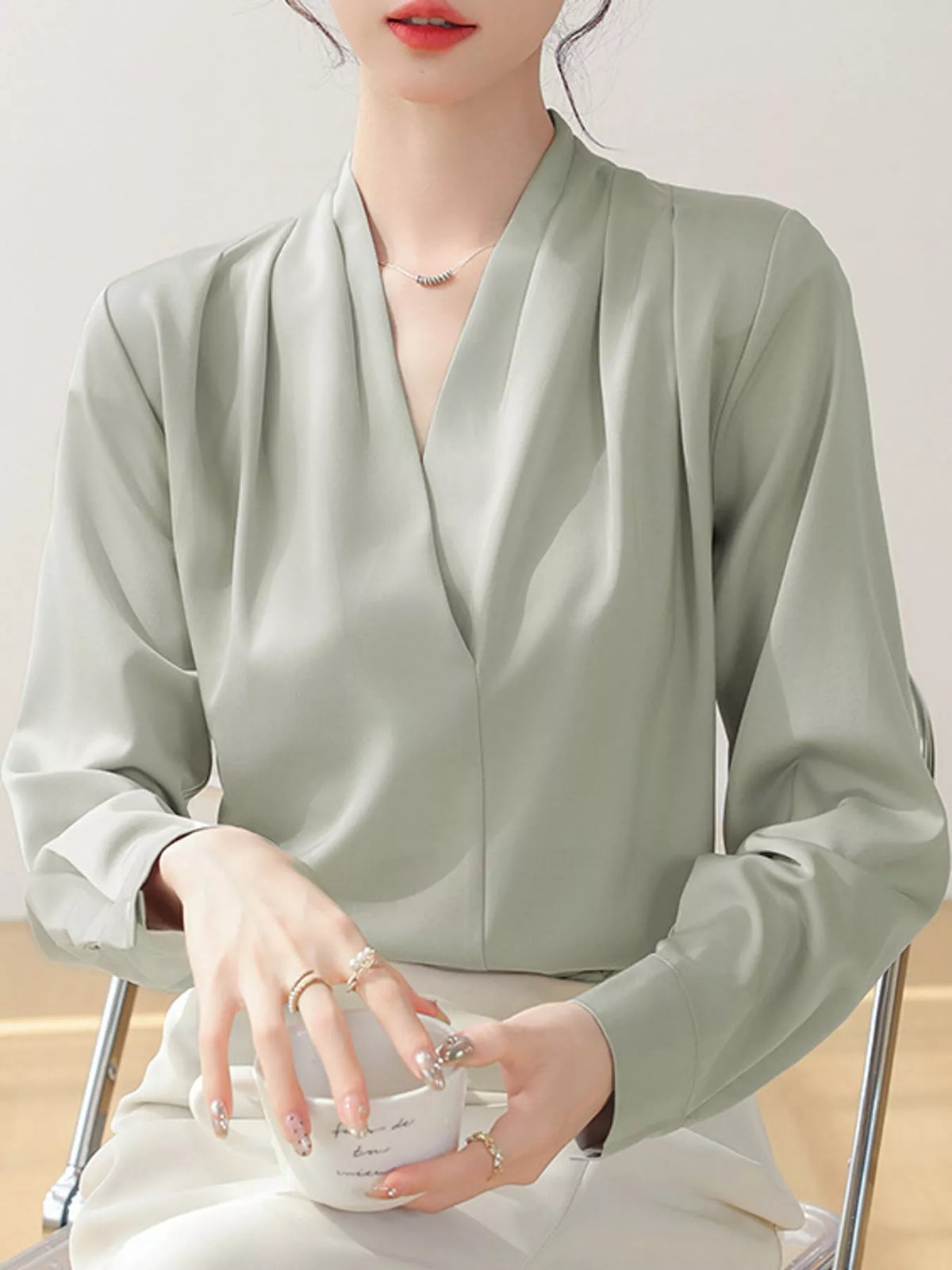 Women's V-Neck Pleated Shoulder Satin Blouse in sage — front view