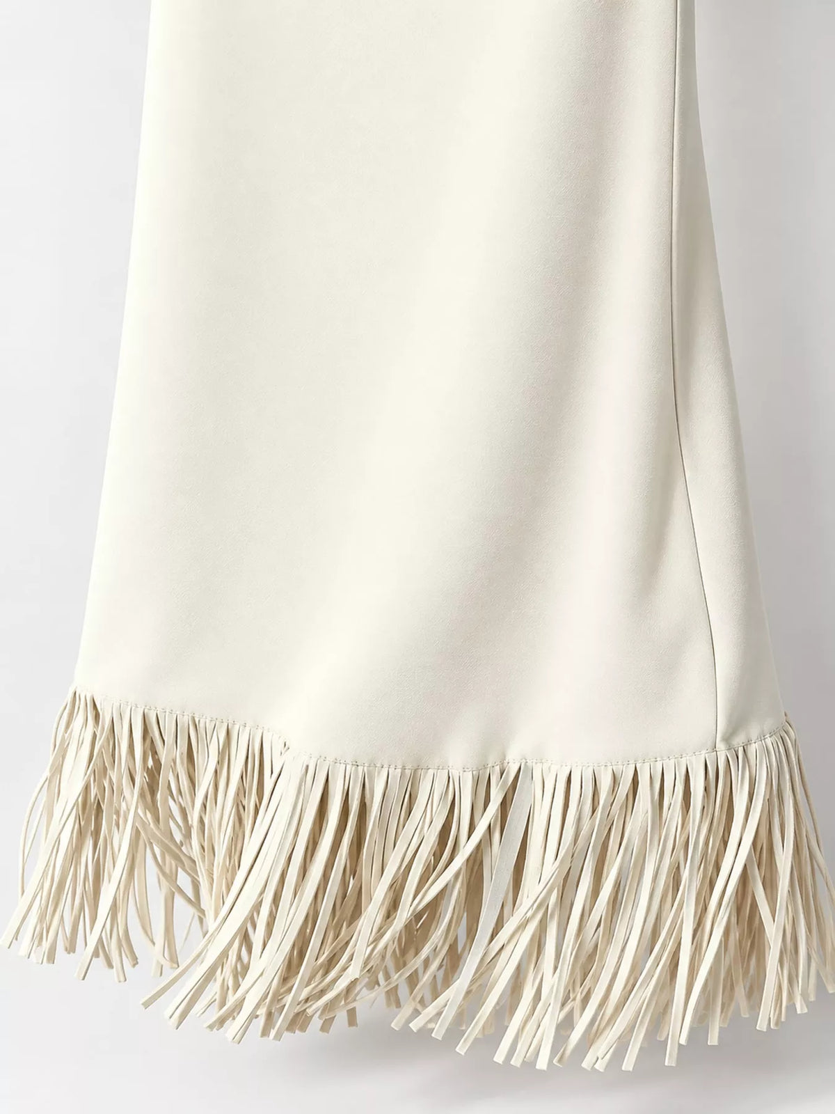 Cream fringe midi skirt, fringed hem and skirt texture