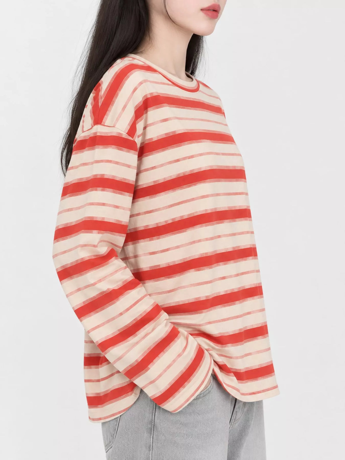 Red and cream striped oversized T-shirt, side view