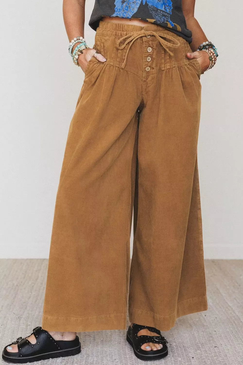 Brown button-detail wide-leg pants, front view