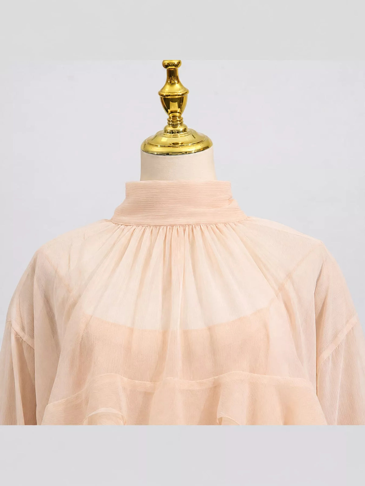 Nude Pink ruffled turtleneck long sleeve blouse