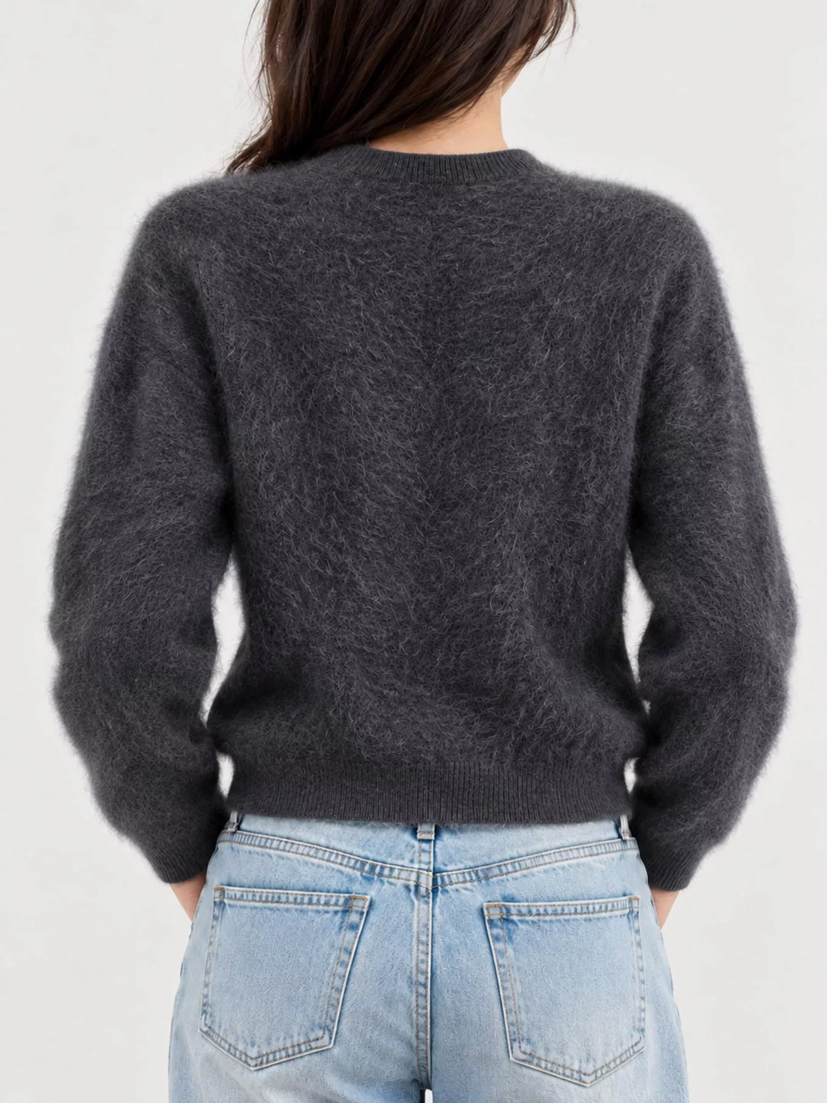 Black fuzzy button up cropped cardigan, back view