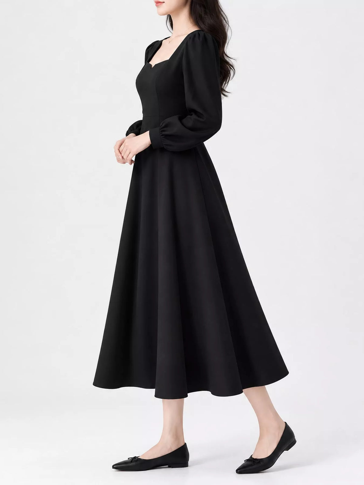 Black long sleeve a line midi dress, side view