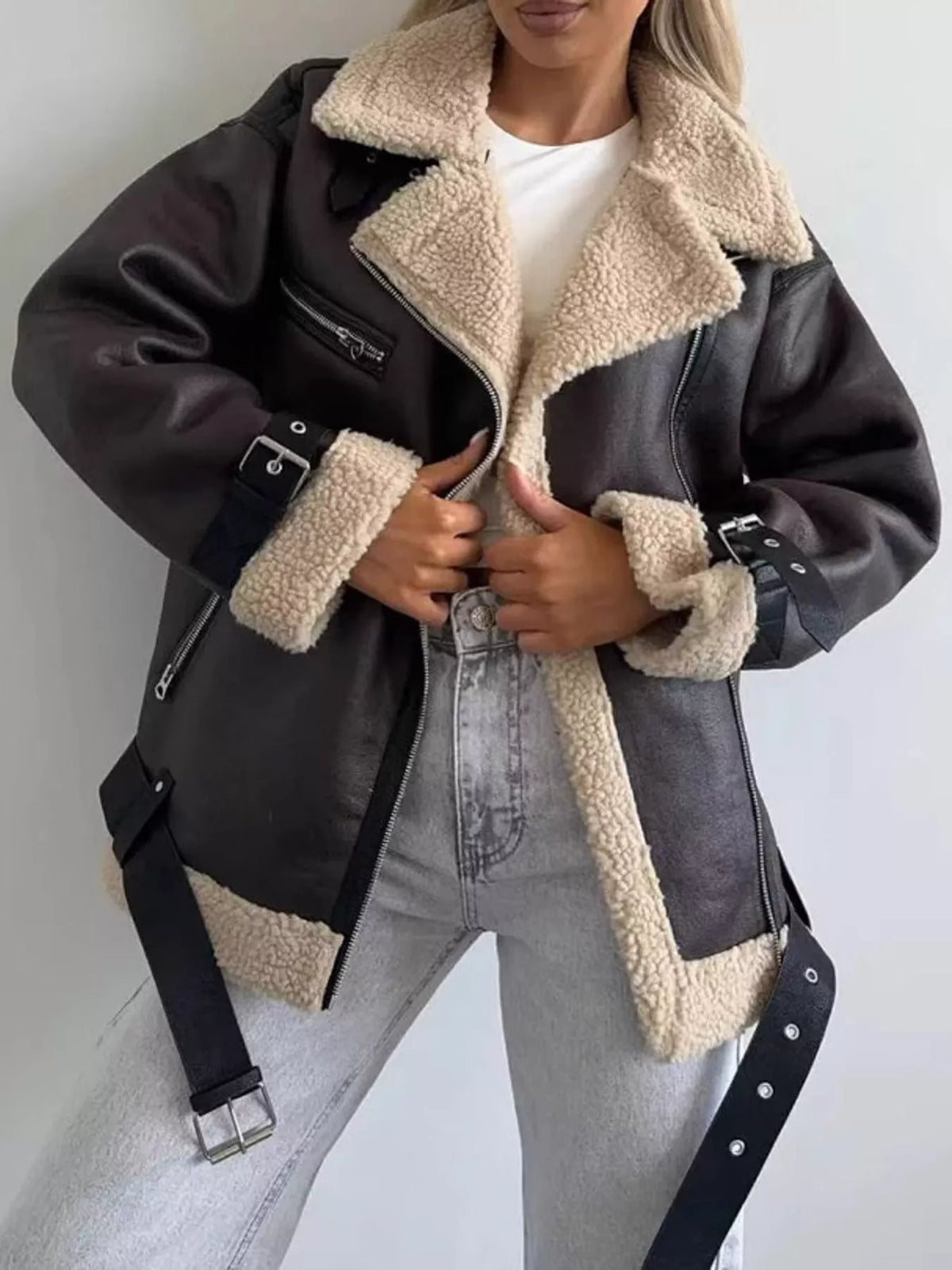 Black with cream trim faux leather zip up jacket, front view