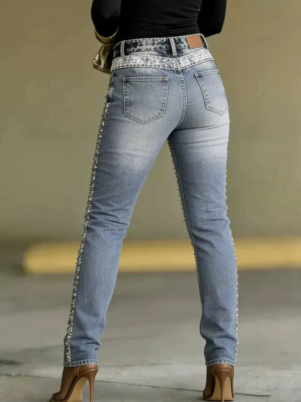 Light Blue rhinestone embellished slim fit jeans, back view