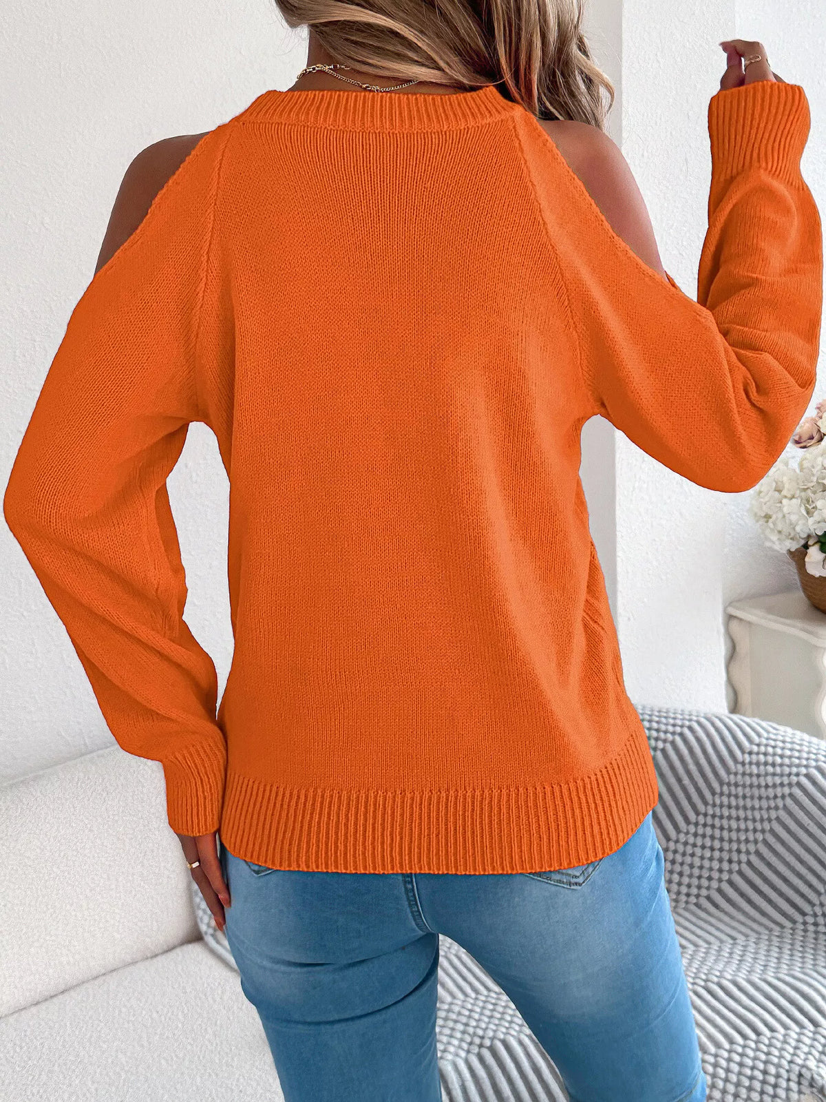 Cold shoulder cable knit sweater, back view