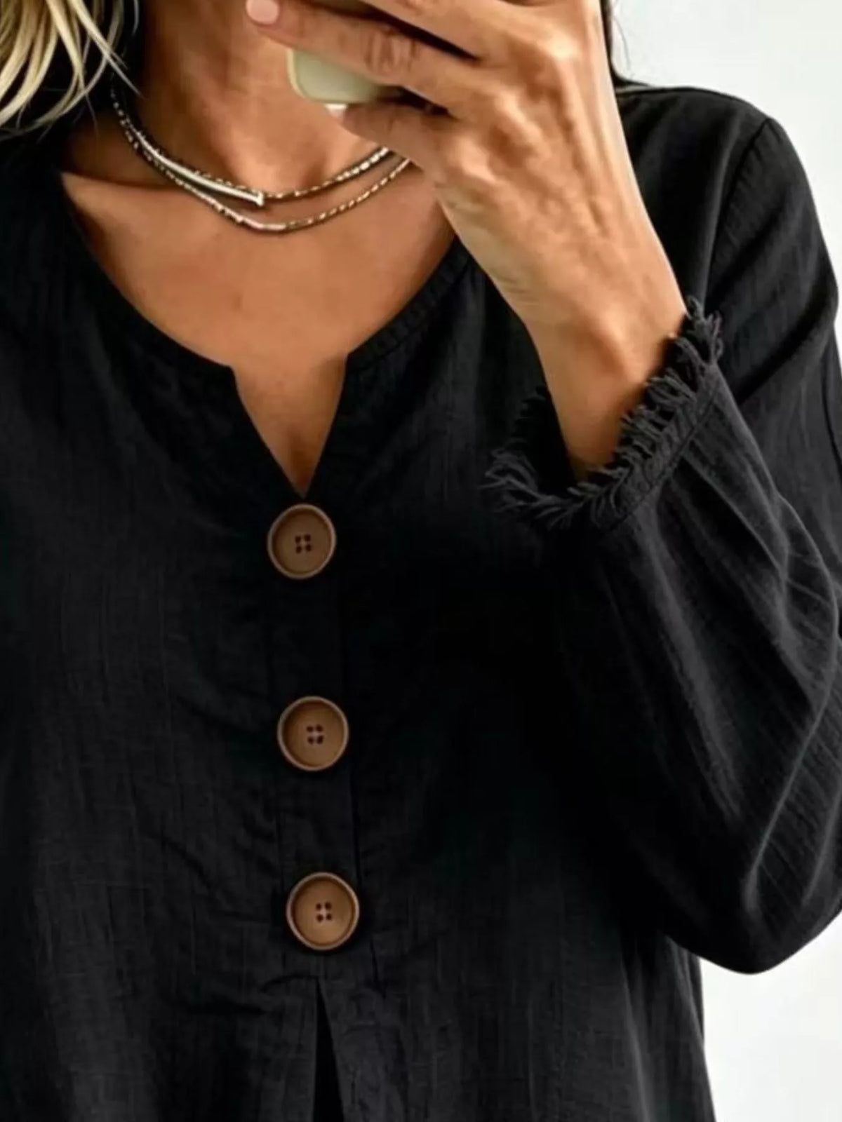 Black Frayed-Hem Long Sleeve Button-Front Blouse neckline and sleeve detail