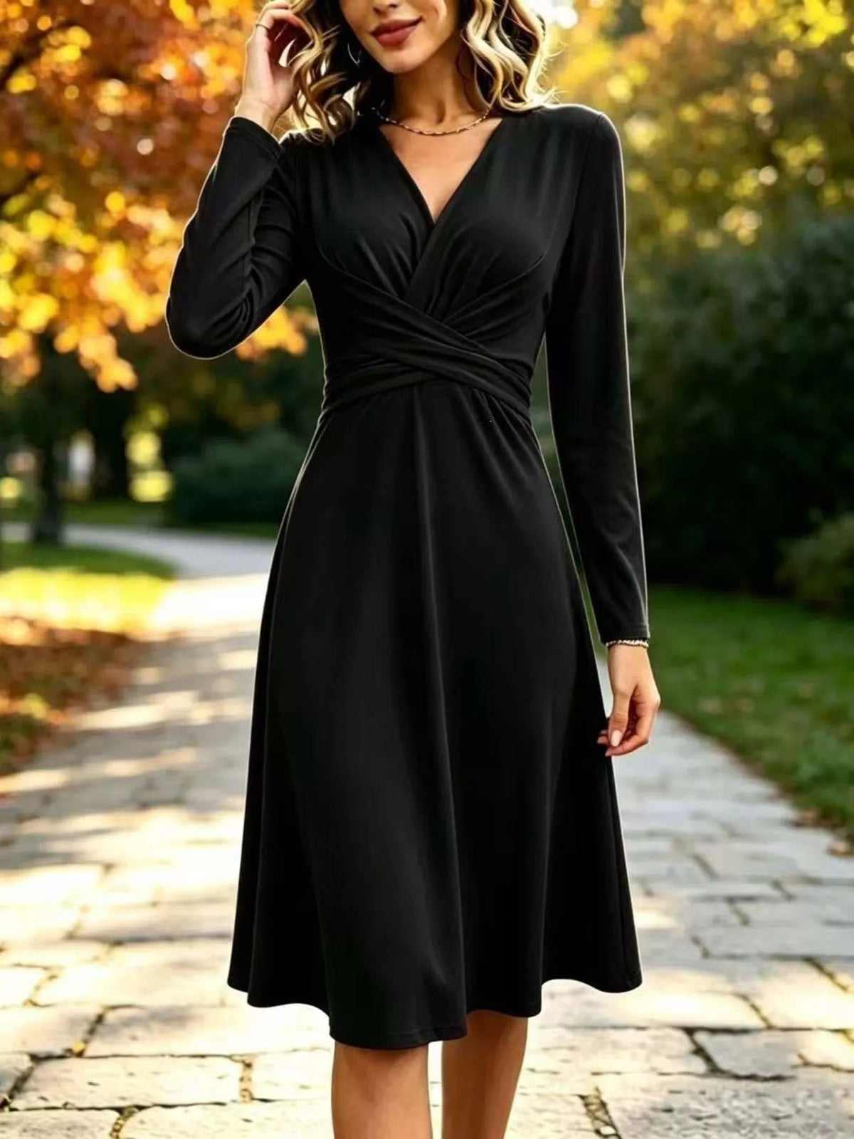Women's V-Neck Ruched Waist Long Sleeve Midi Dress in black — front view
