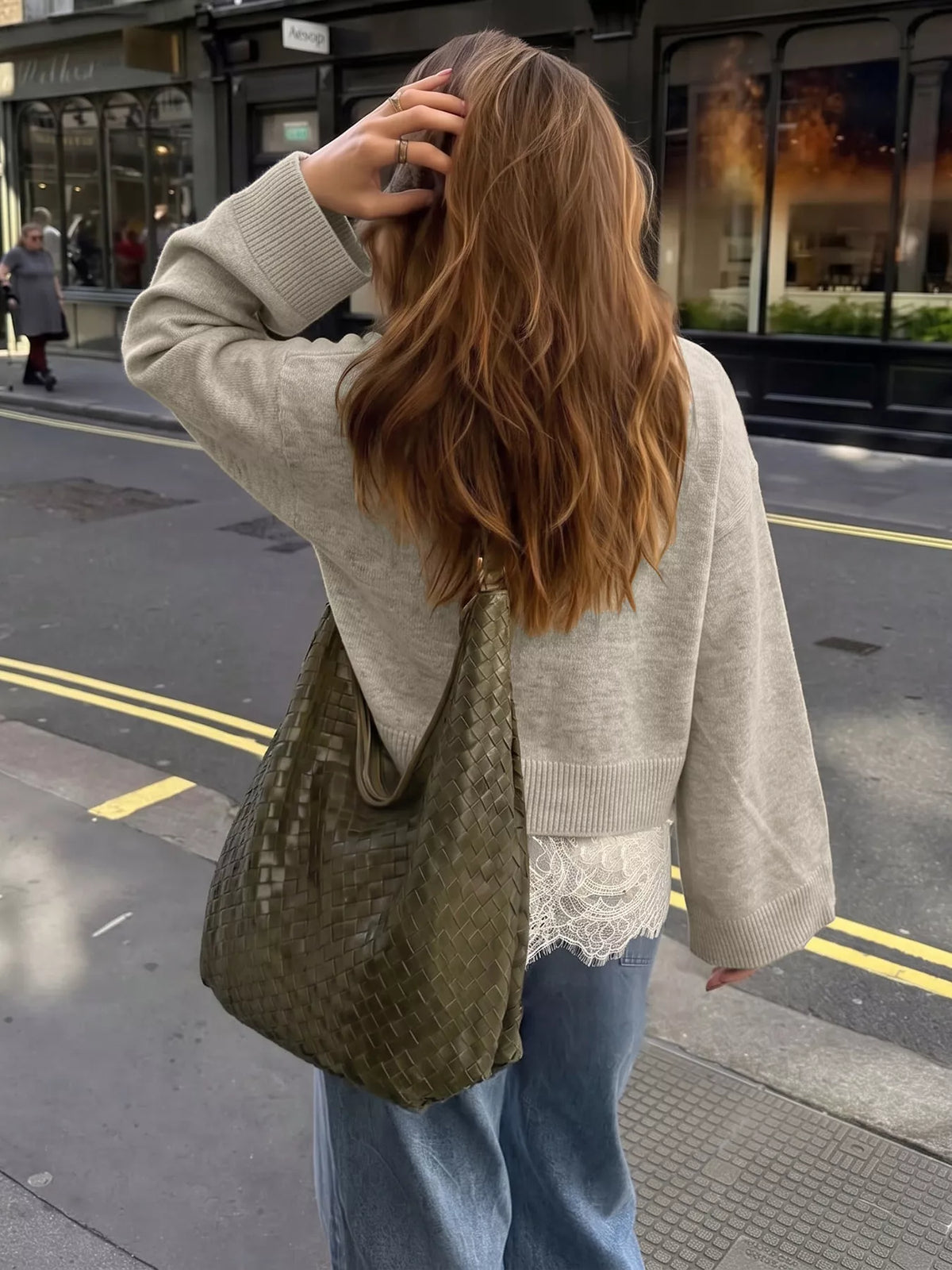 Beige layered lace hem sweater, back view