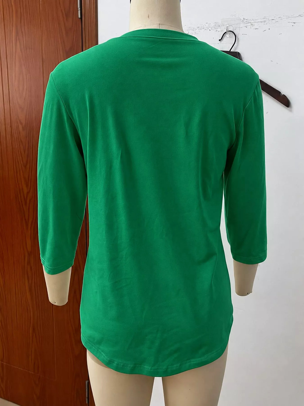 Green v-neck half sleeve t-shirt, back view