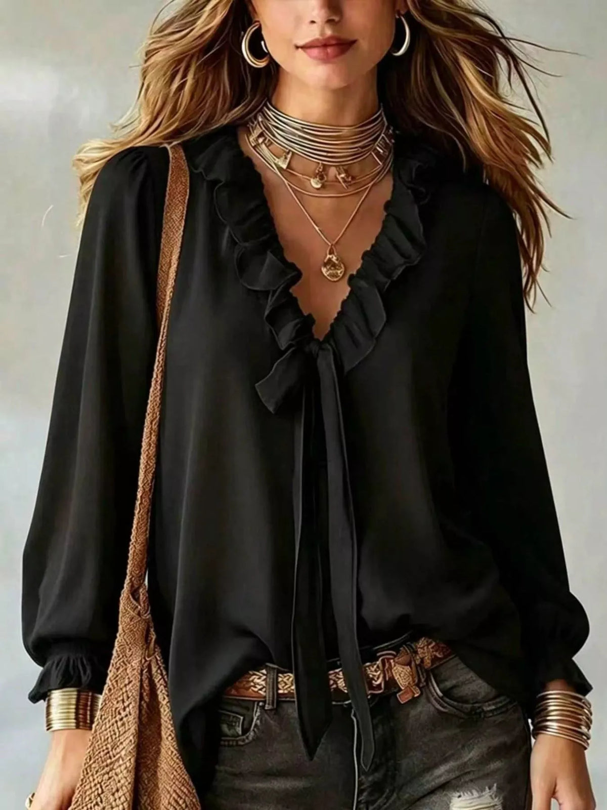 Black ruffled v-neck blouse with tie-front detail