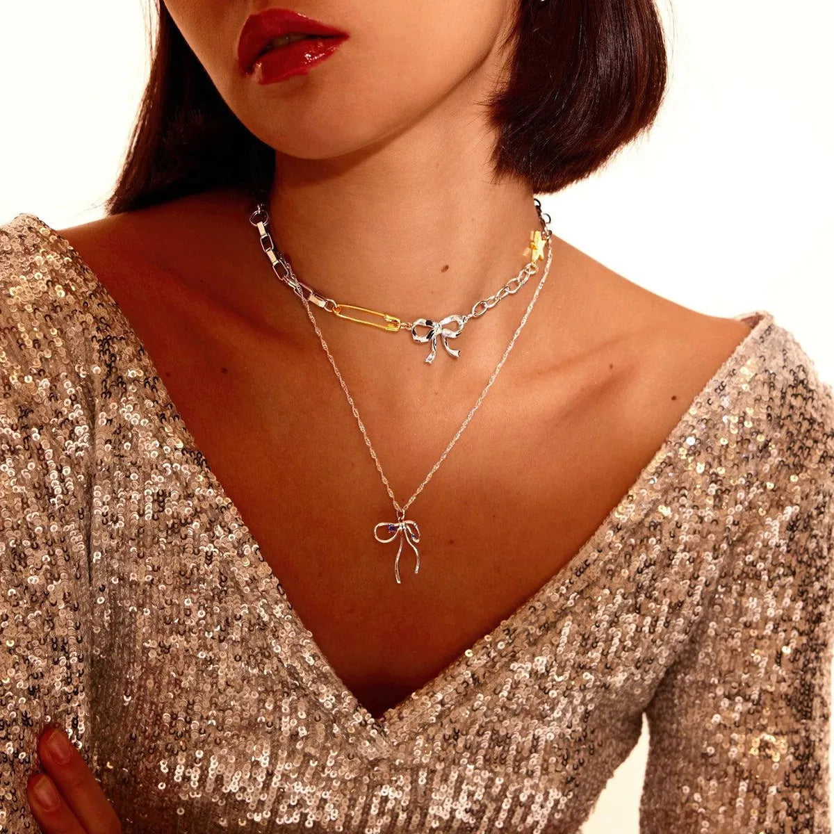 Trendsi Two-Tone Bow Star Necklace -