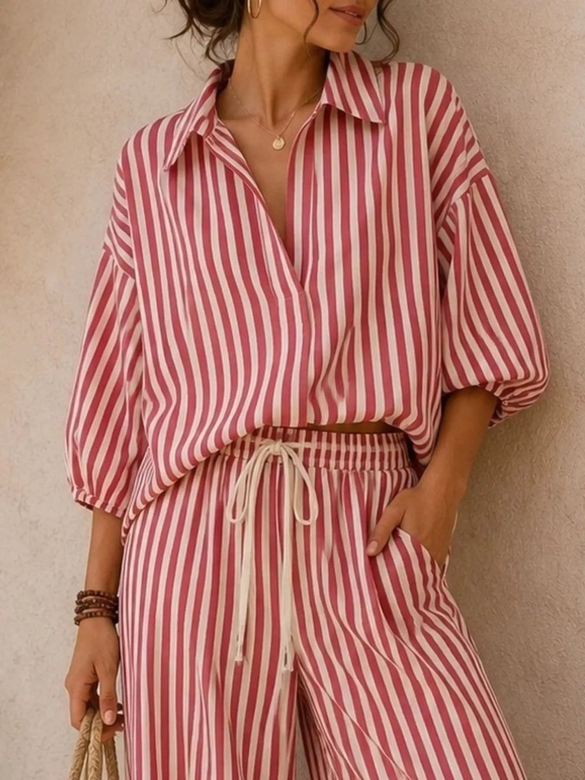 Pink striped shirt and wide-leg pants set, shirt and waistband detail