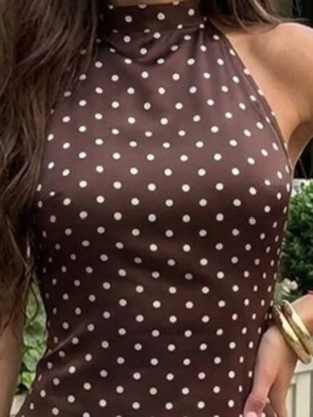 Brown and white polka dot halter neck mini dress, detail view