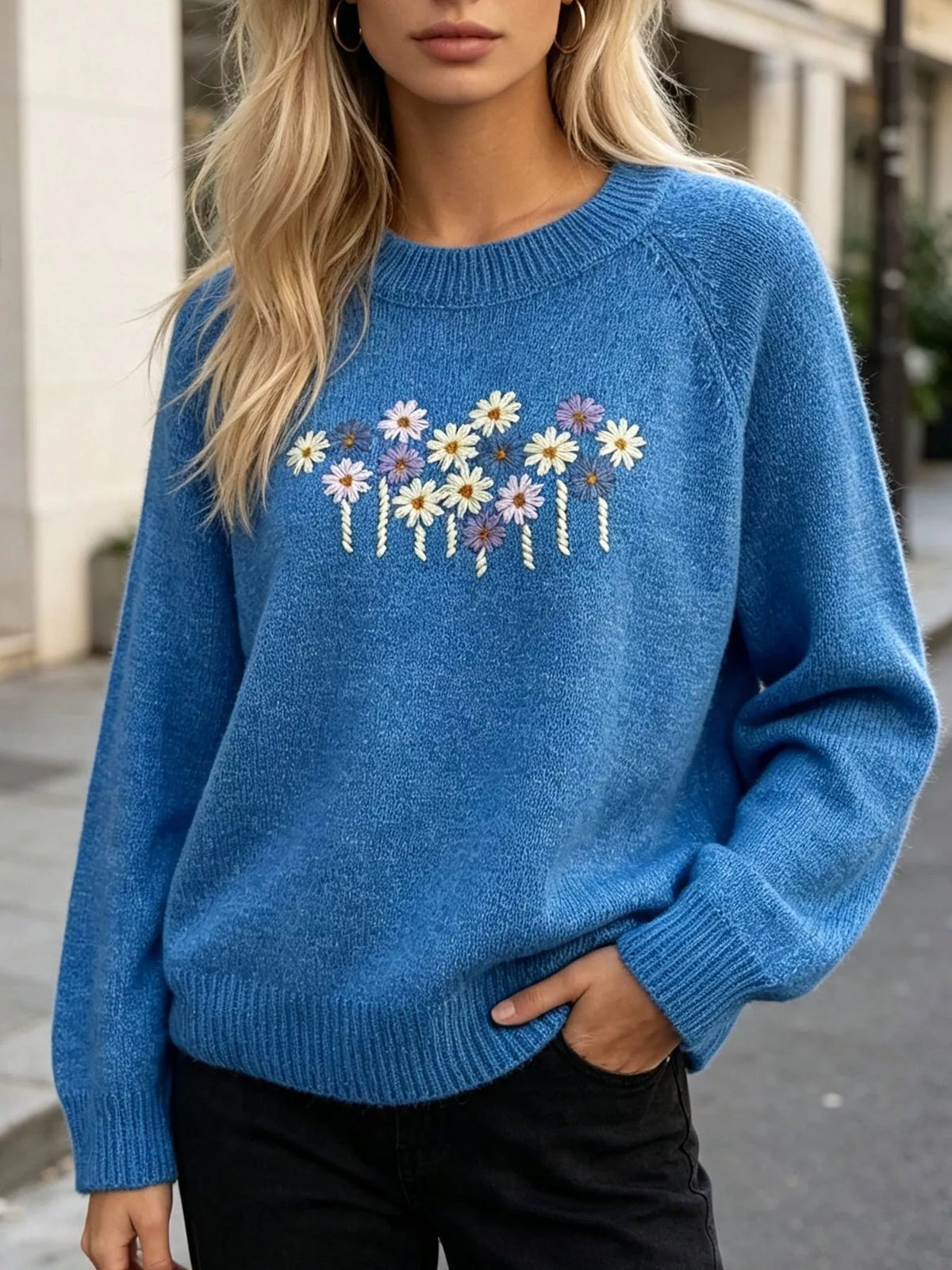 Floral embroidered round-neck sweater in blue, front view