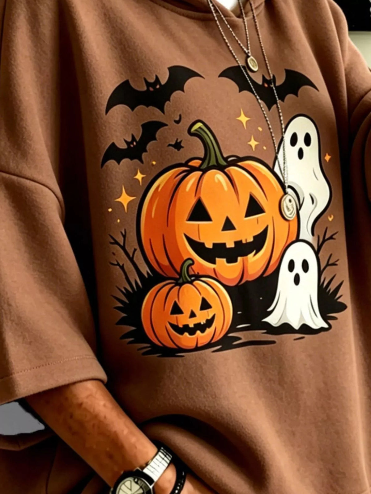 Brown oversized halloween pumpkin ghost hoodie, detail view
