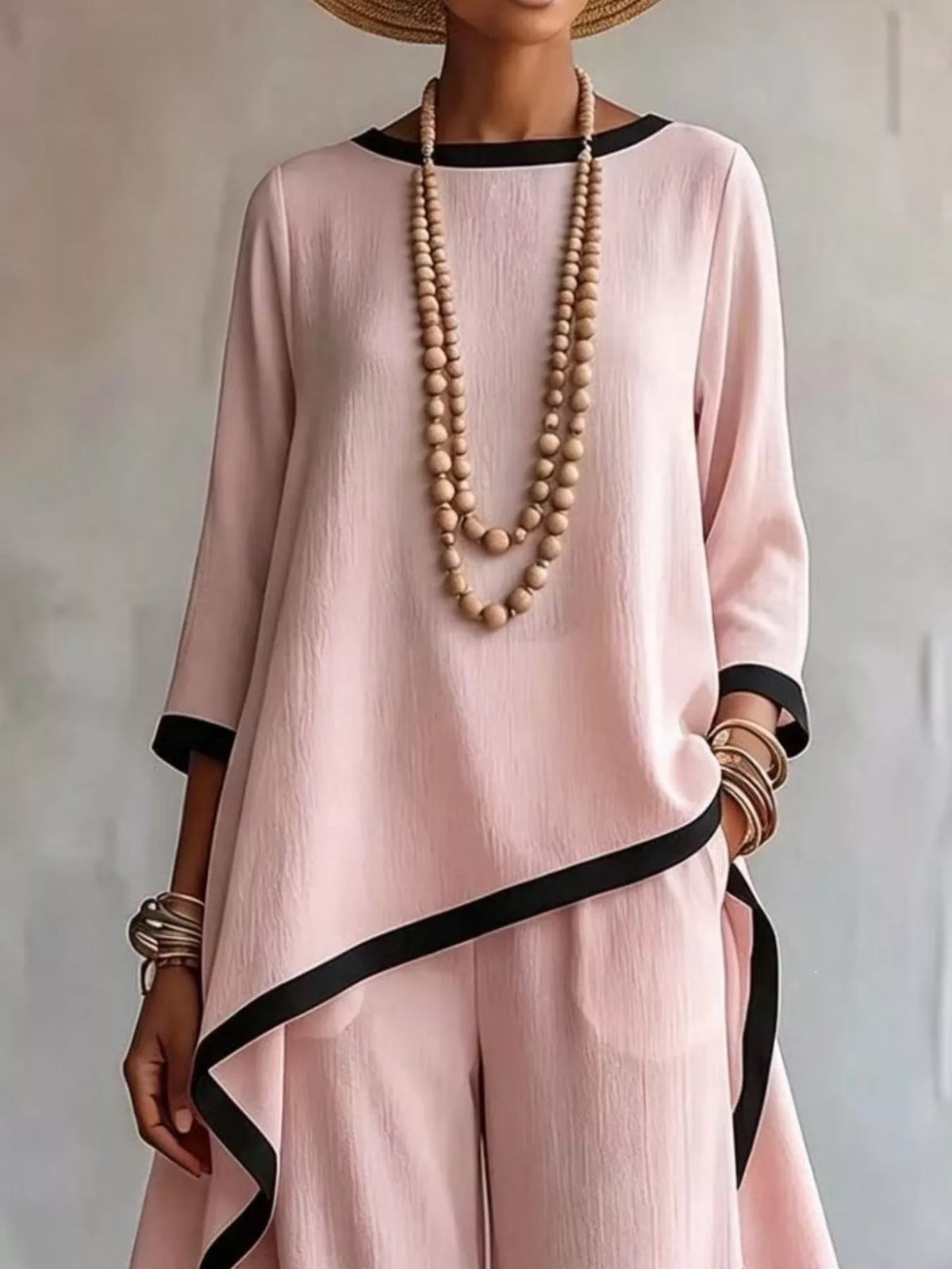 Pink contrast-trim top and pants set, asymmetric top detail