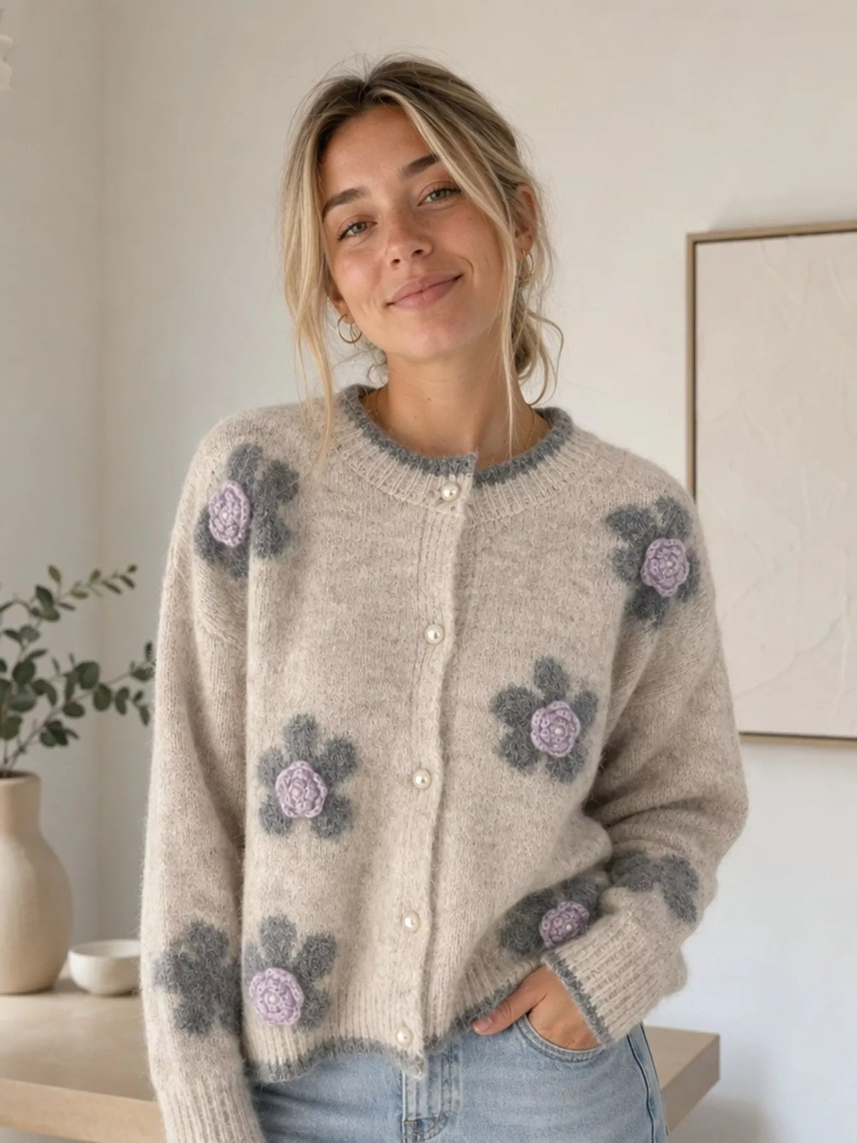 Floral-applique knit cardigan in beige, front view indoors