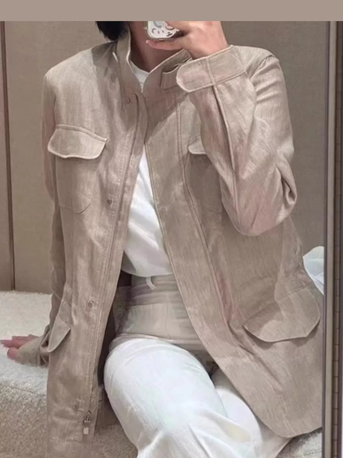 Beige lightweight multi pockets jacket — front view
