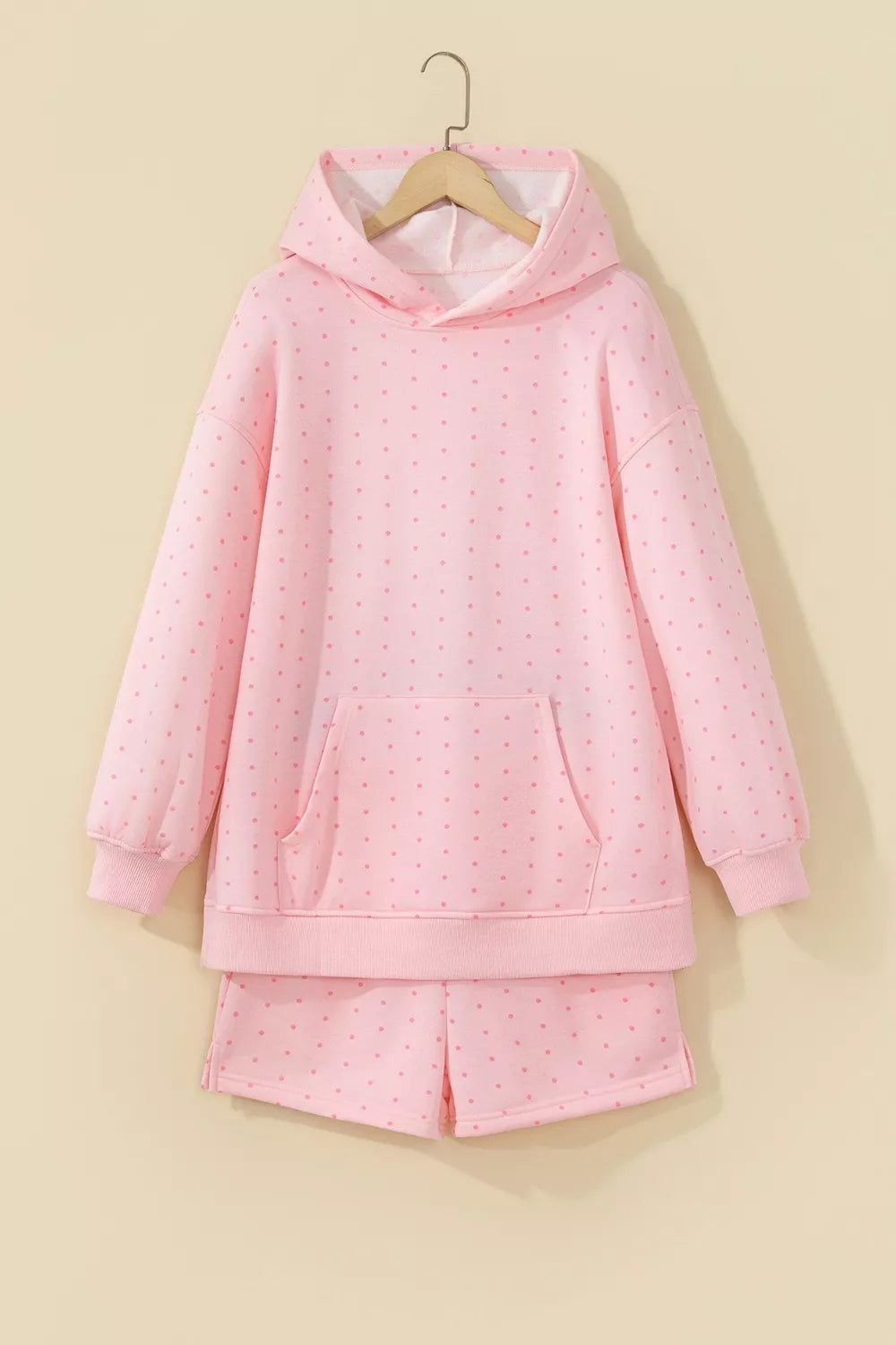 Pink polka dot oversized hoodie and shorts set — front view