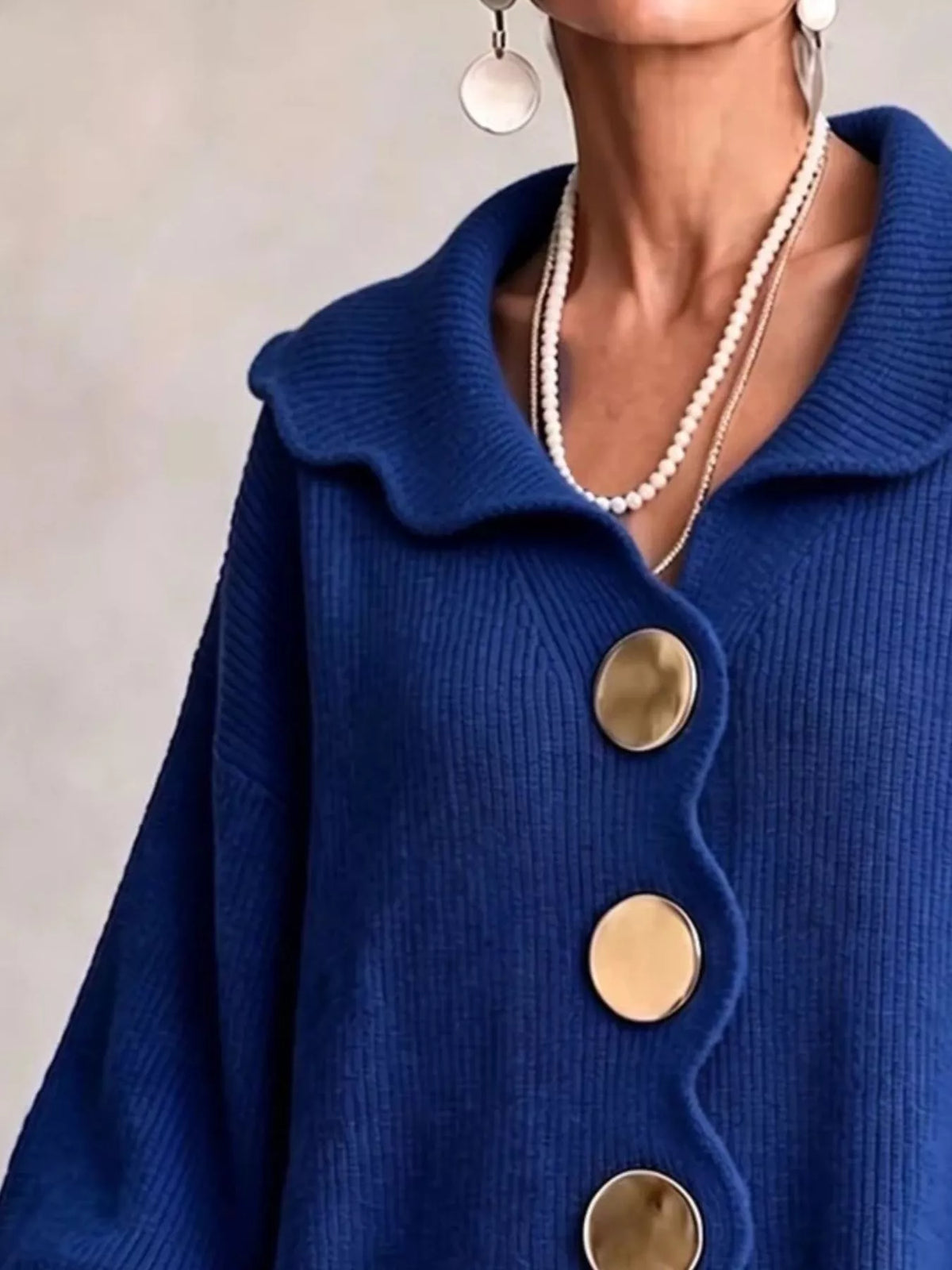 Blue scalloped-edge knit cardigan, collar detail
