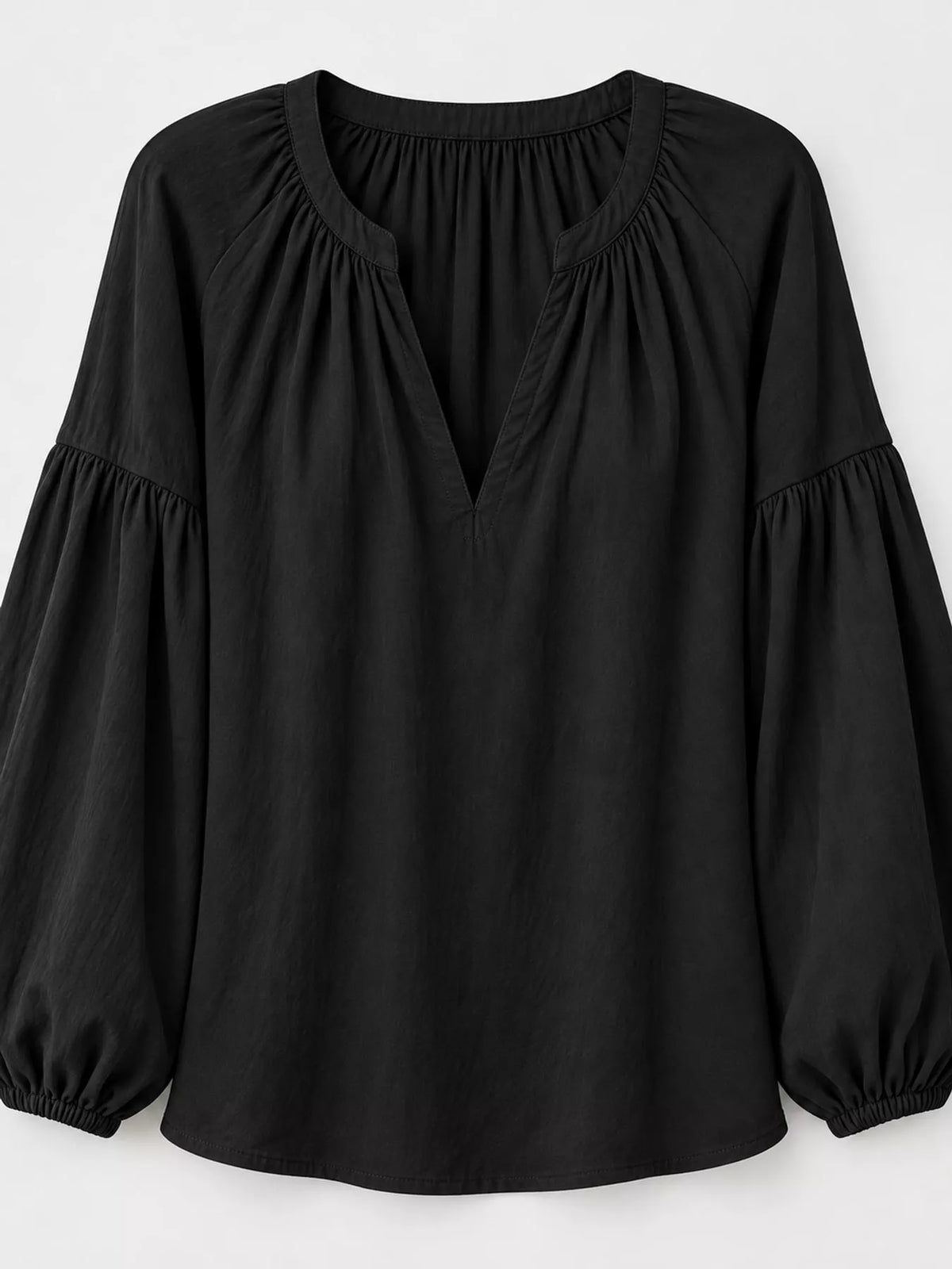 Notched Balloon Sleeve Blouse in black, back view