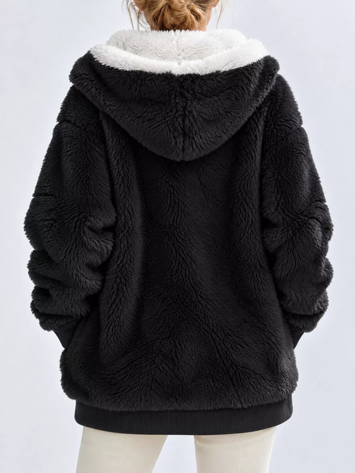Black with white hood trim faux fur zip up hooded jacket, back view