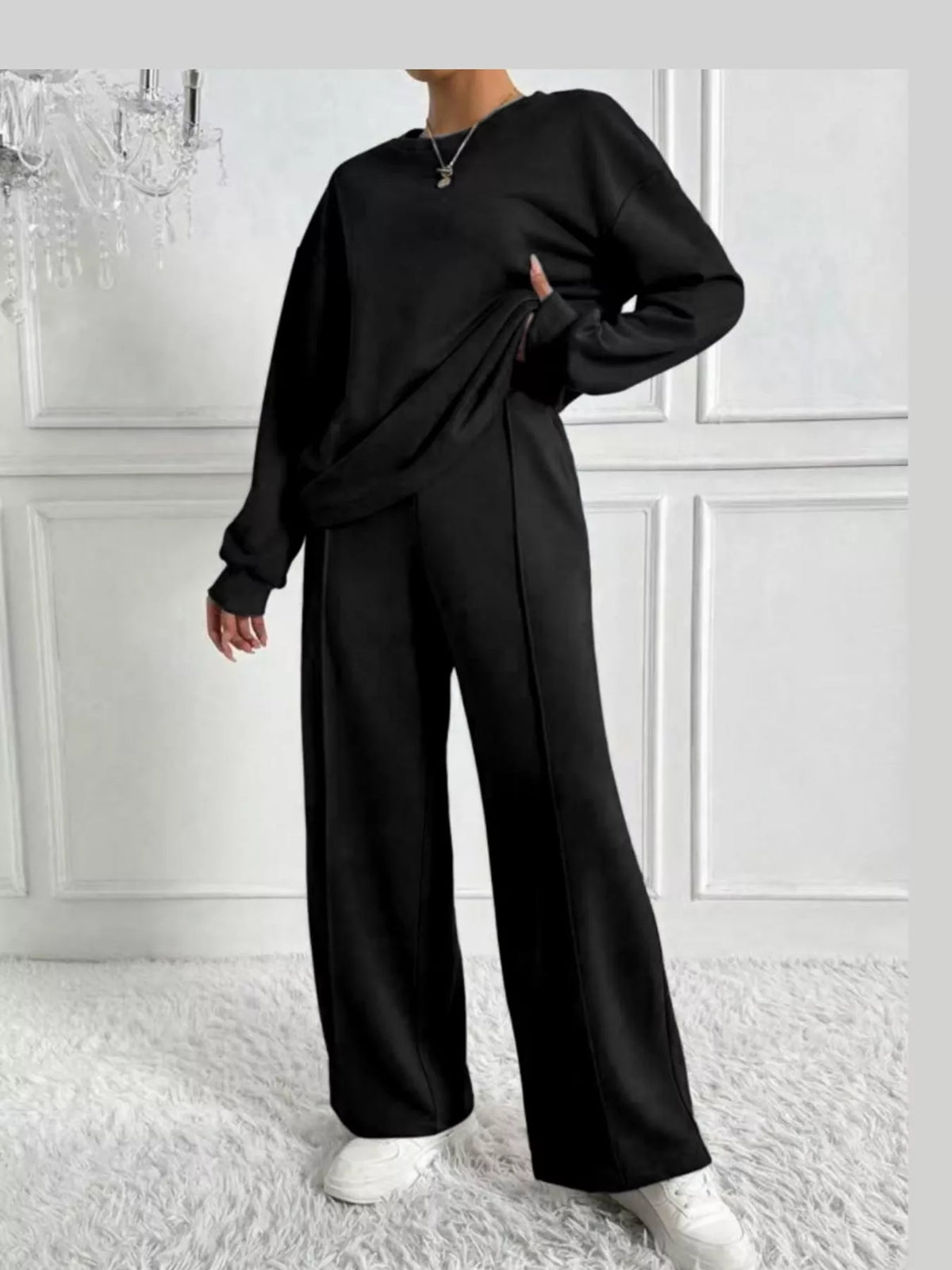 Black oversized sweatshirt and wide-leg pants set — front view