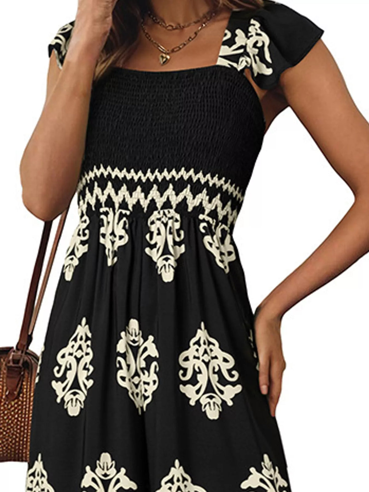 Wide-leg ornamental-print short-sleeve jumpsuit, garment detail