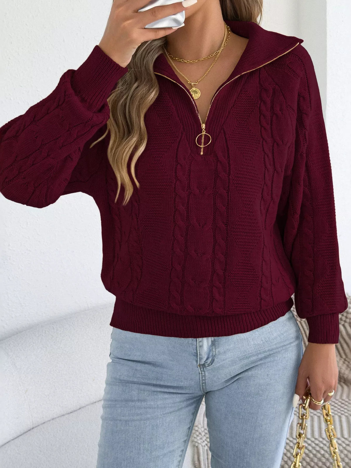 Burgundy quarter-zip cable knit sweater