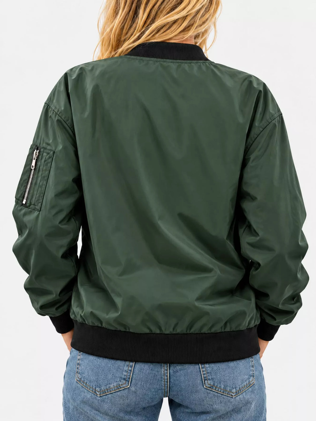 Green zip-up bomber jacket — back view